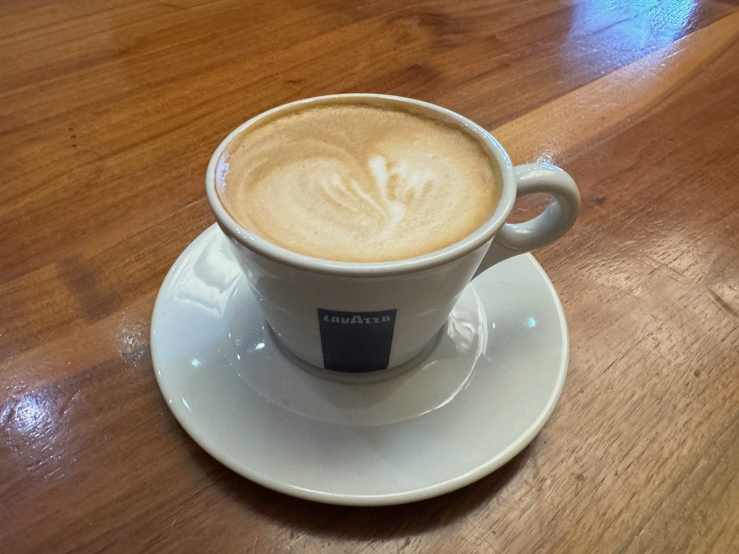 a cup of coffee on a saucer