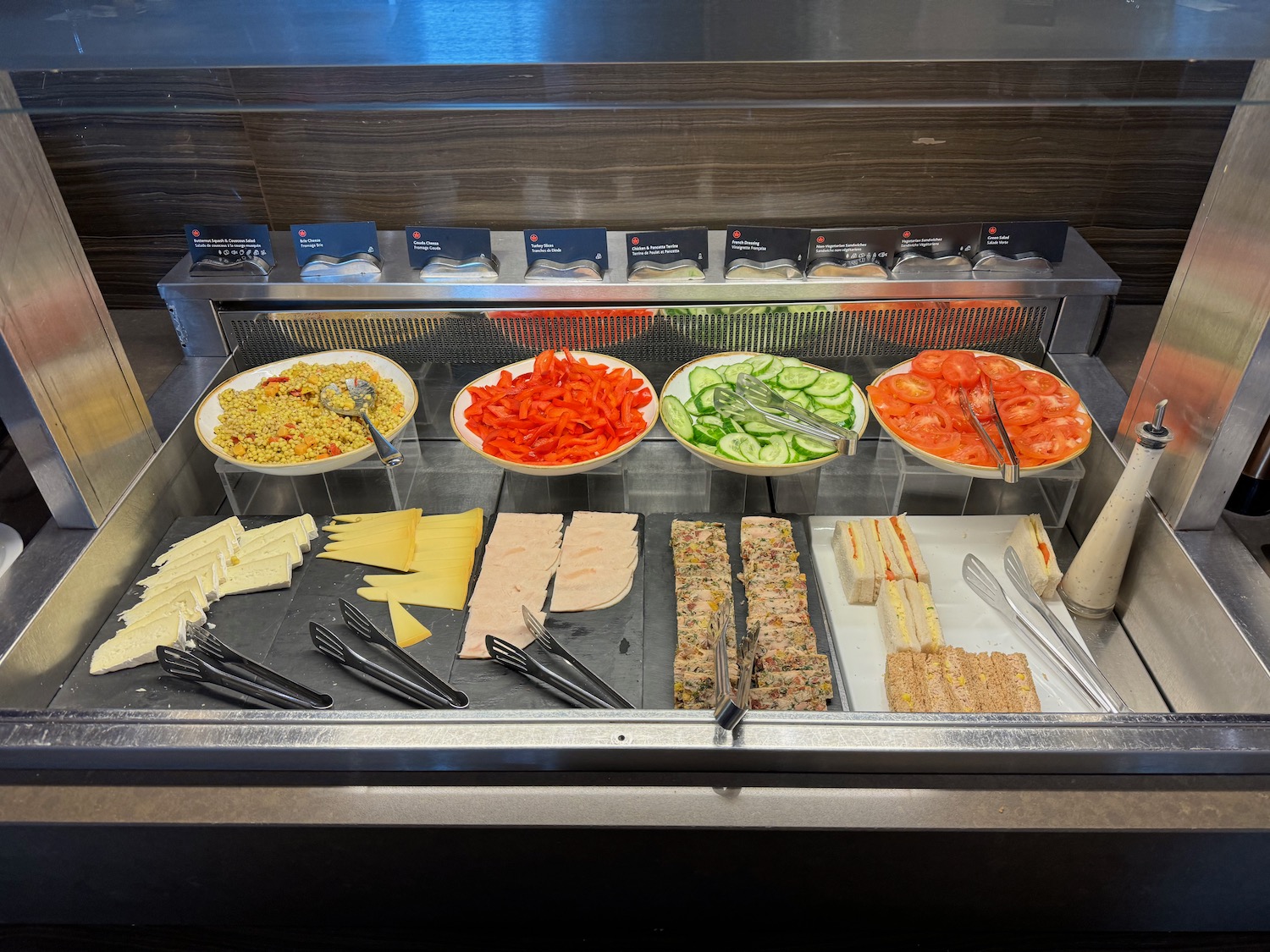 a buffet with different food items on it