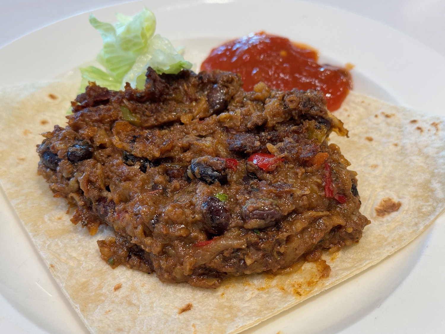 a plate of food with sauce