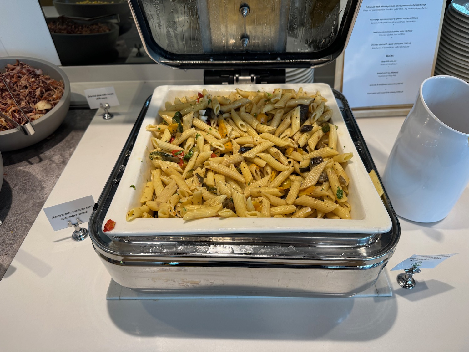 a bowl of pasta in a container