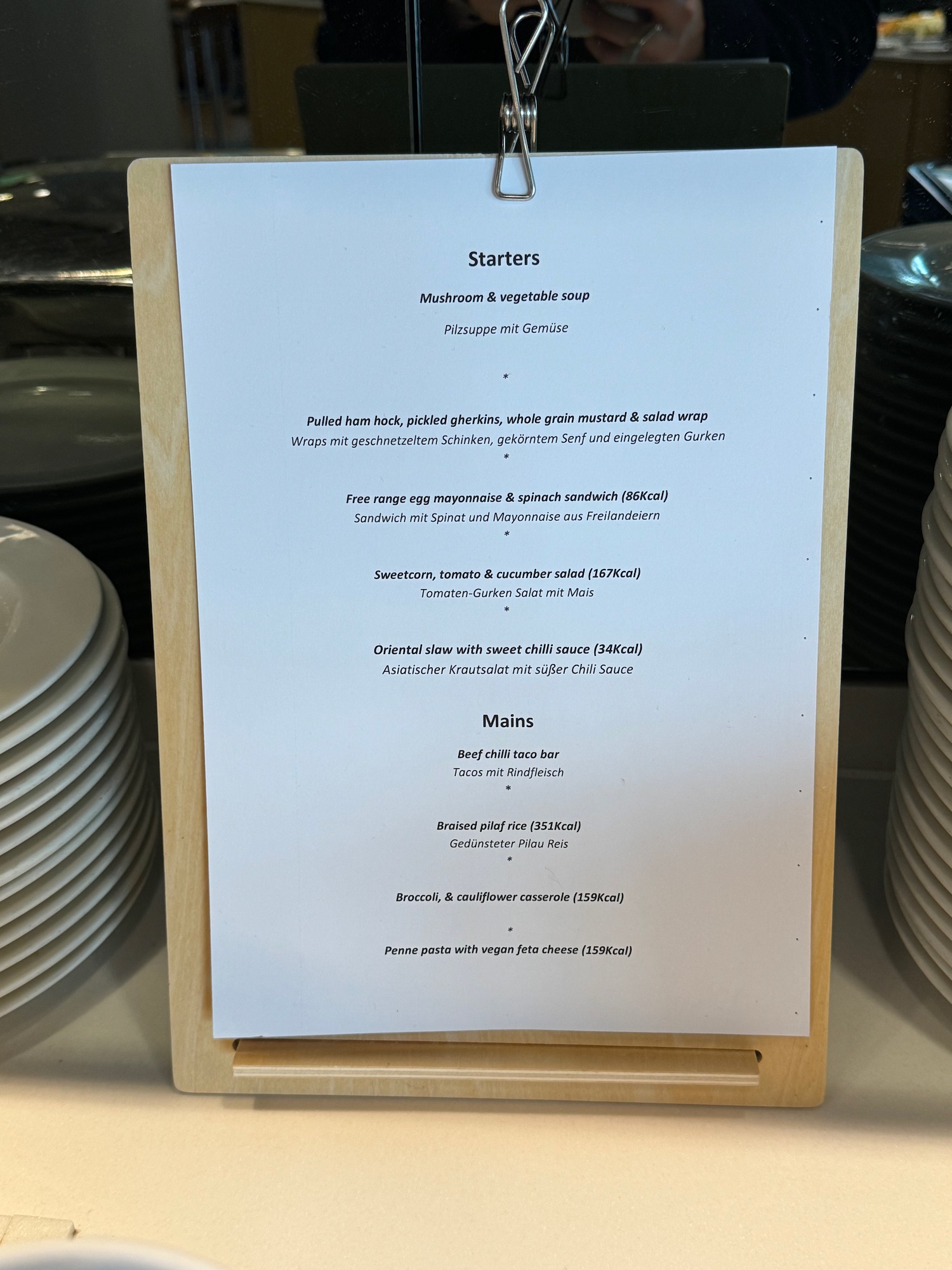 a menu on a wooden stand