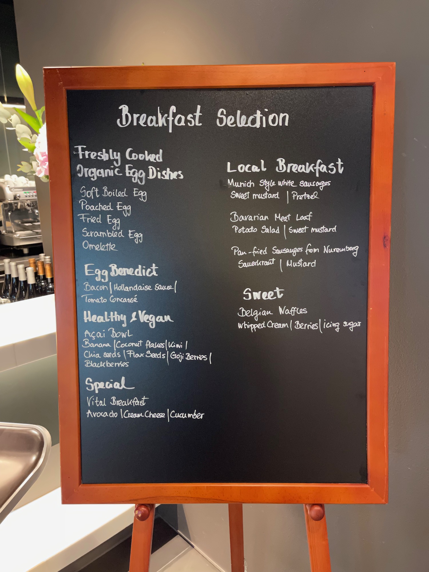 a menu board with white writing on it