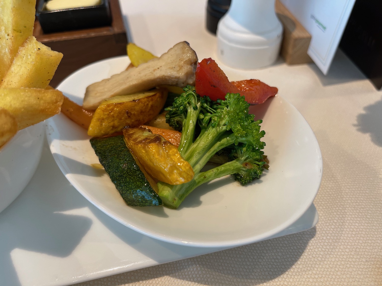 a plate of vegetables and meat