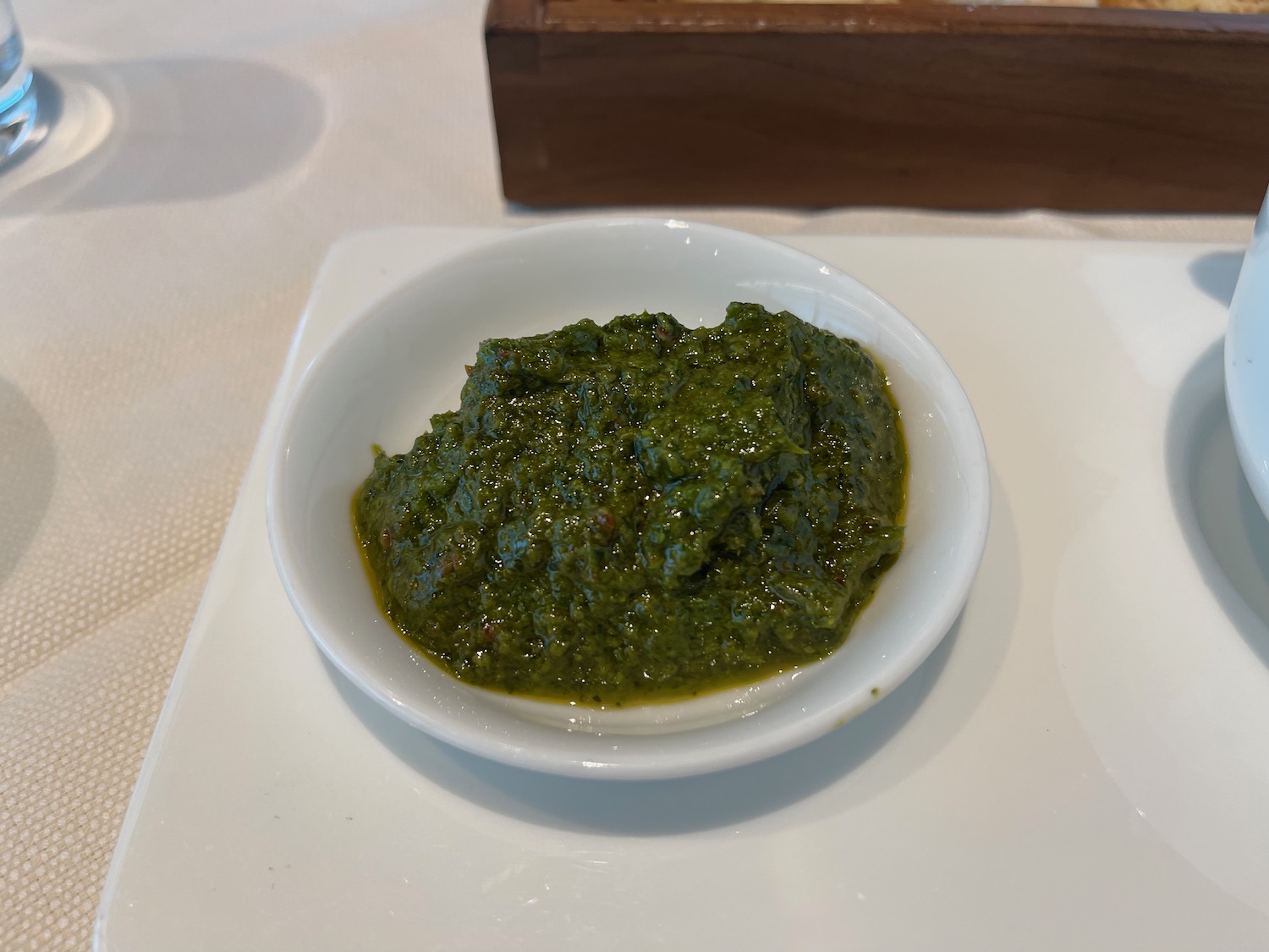 a bowl of green sauce