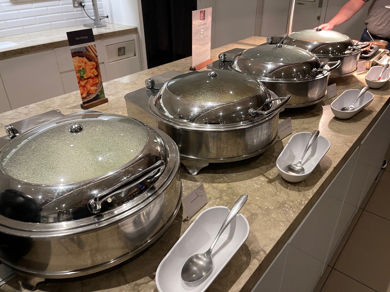 a group of pots on a counter