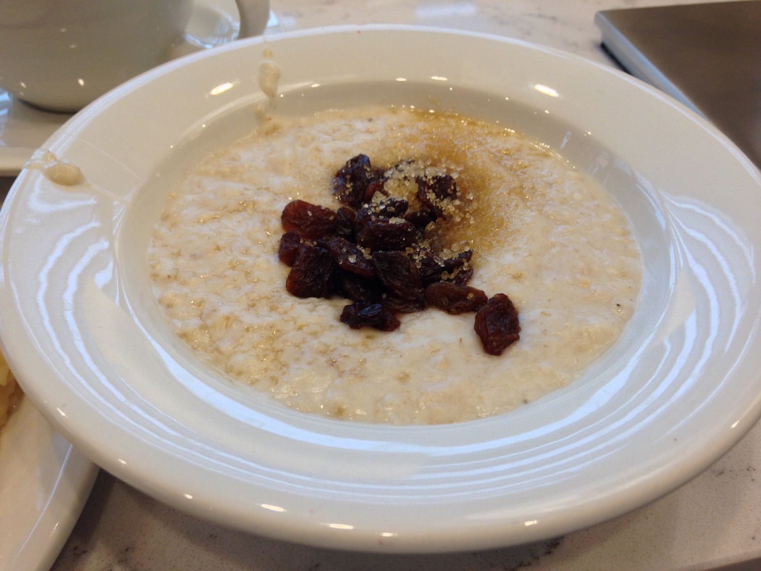 a bowl of oatmeal with raisins