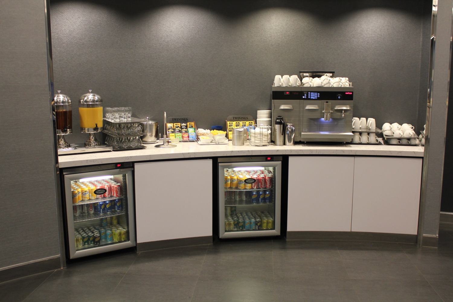 a counter with drinks and beverages