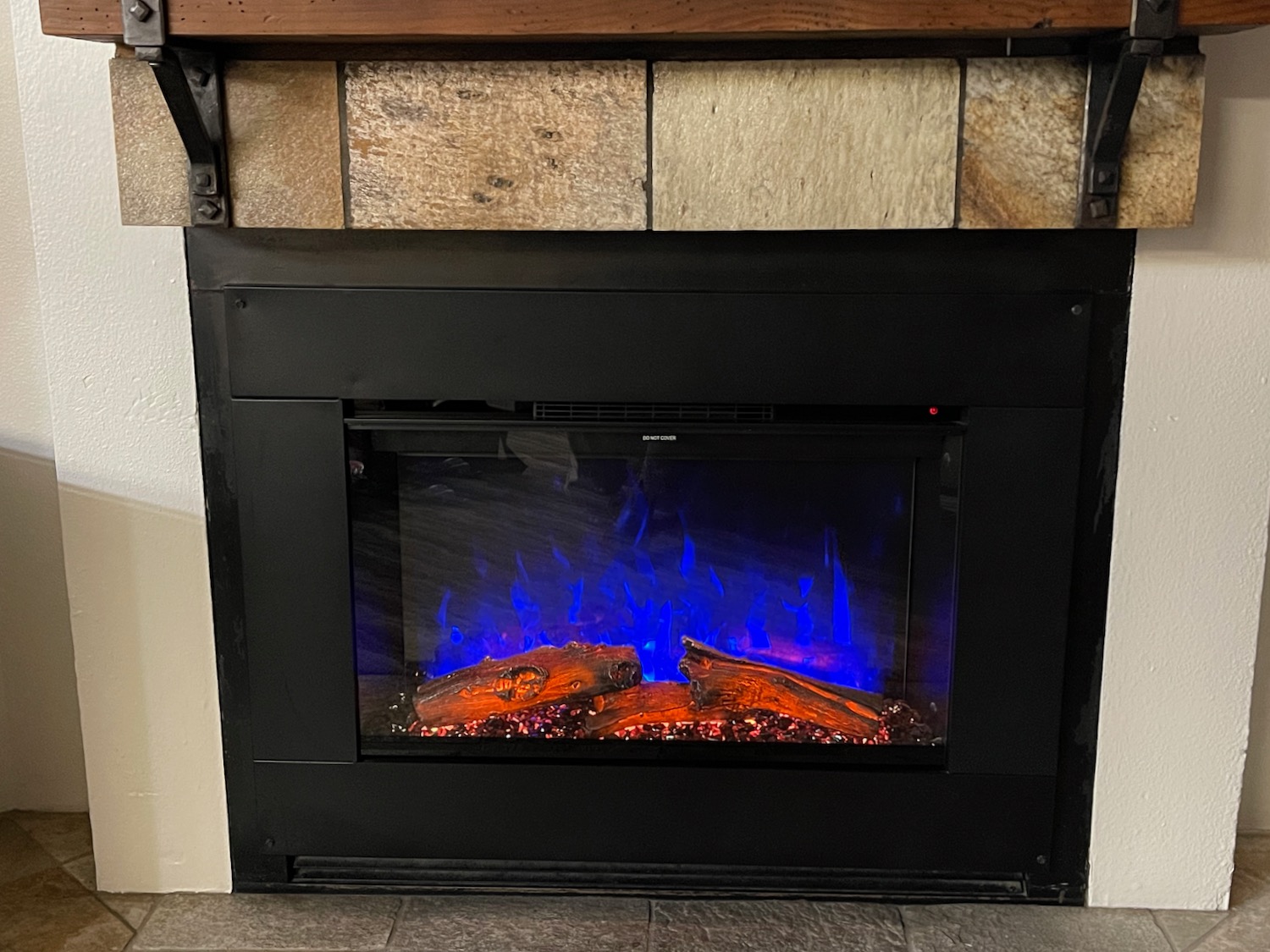 a fireplace with blue flames