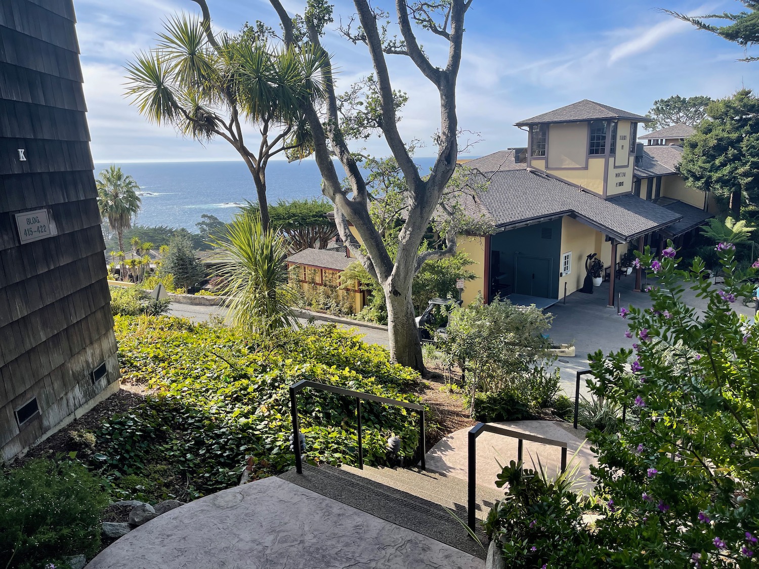 a house with a beach and trees