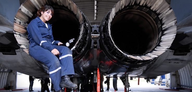 a woman sitting on a plane