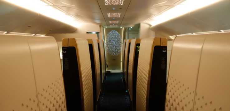 a row of rows of seats in a plane
