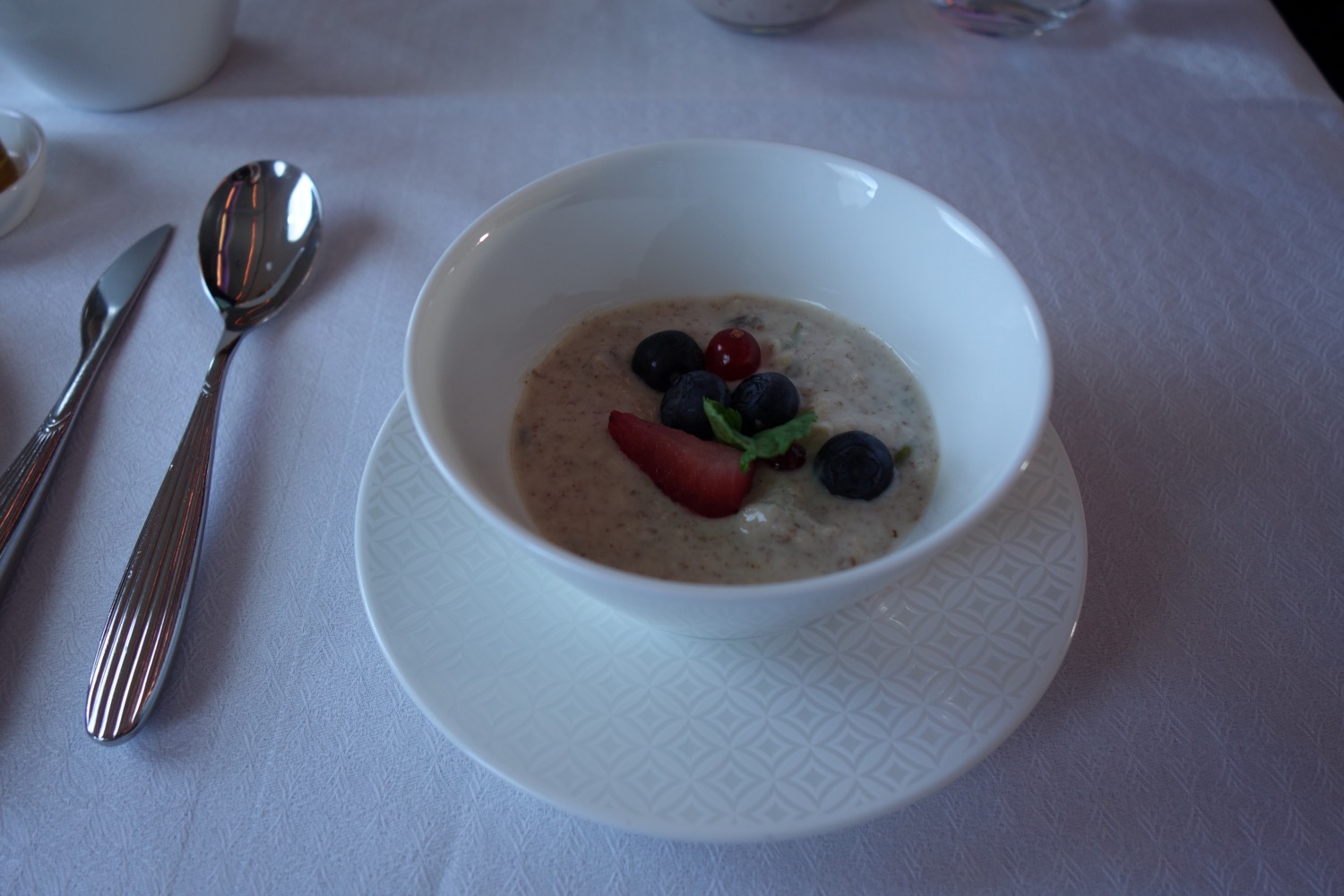 a bowl of oatmeal with berries