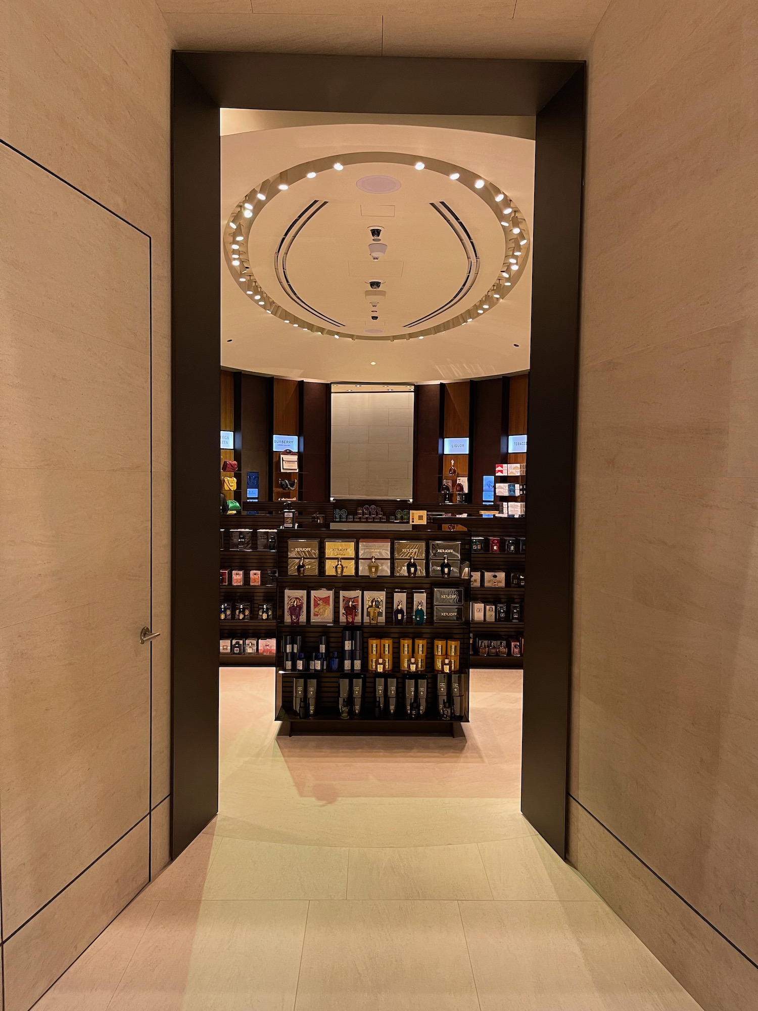 a room with a store with shelves of liquor