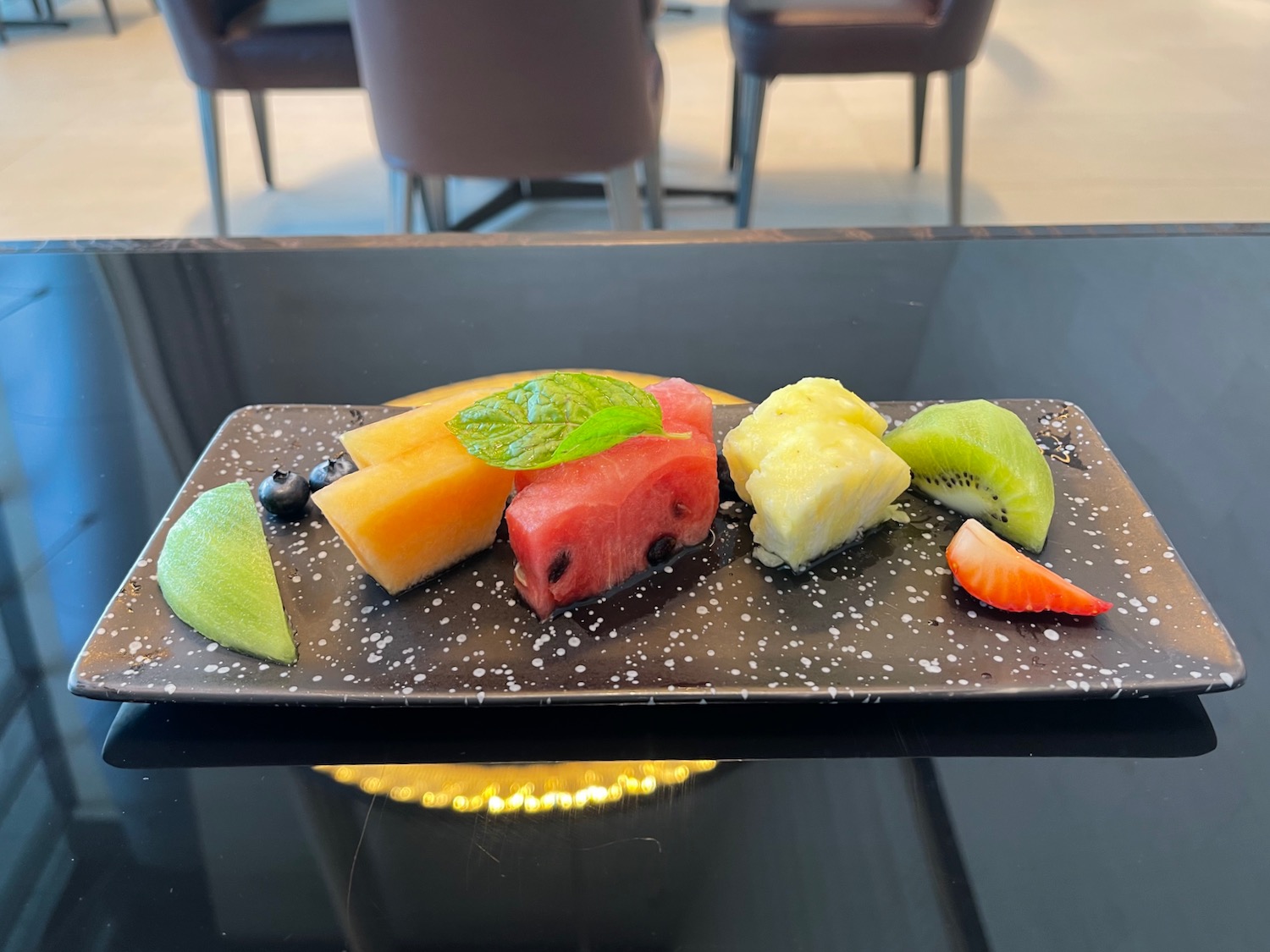 a plate of fruit on a table