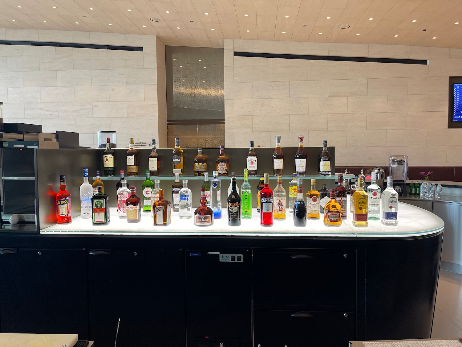 a group of bottles of alcohol on a counter