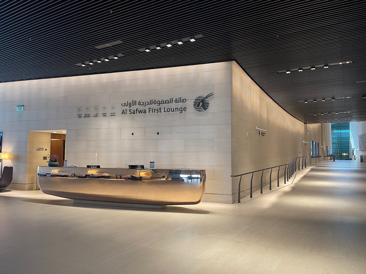 a lobby of a building with a reception desk