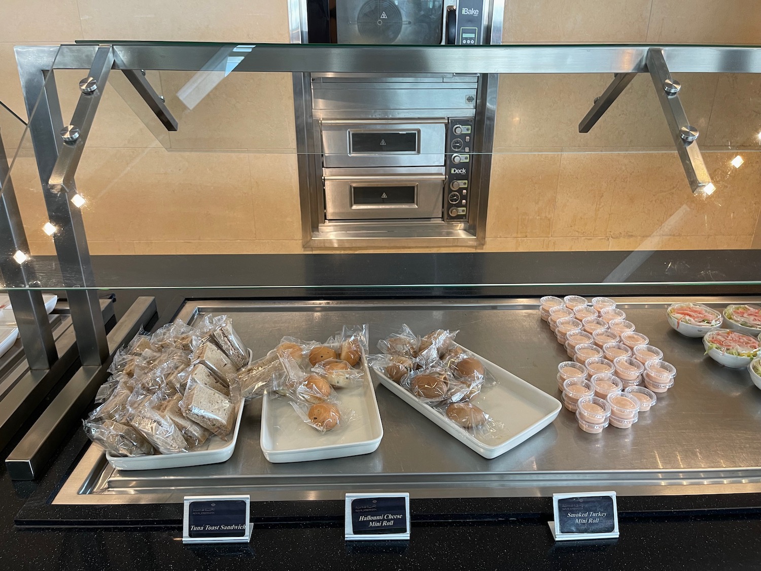 a trays of food on a counter