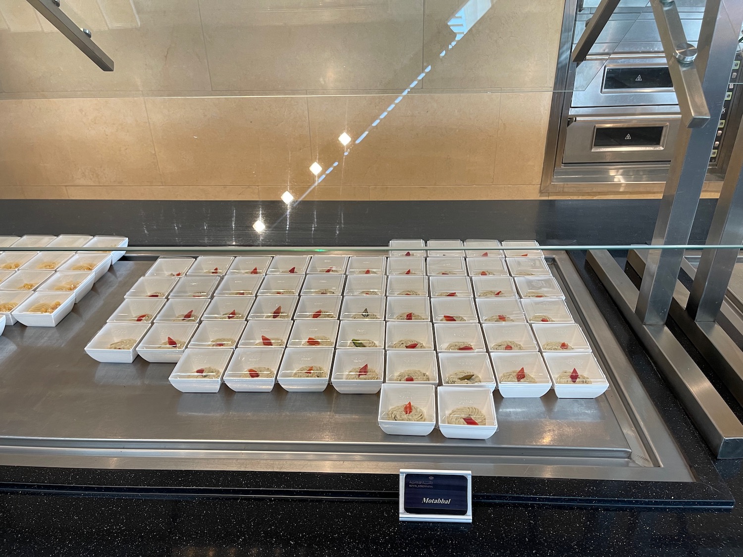 a trays of food on a counter