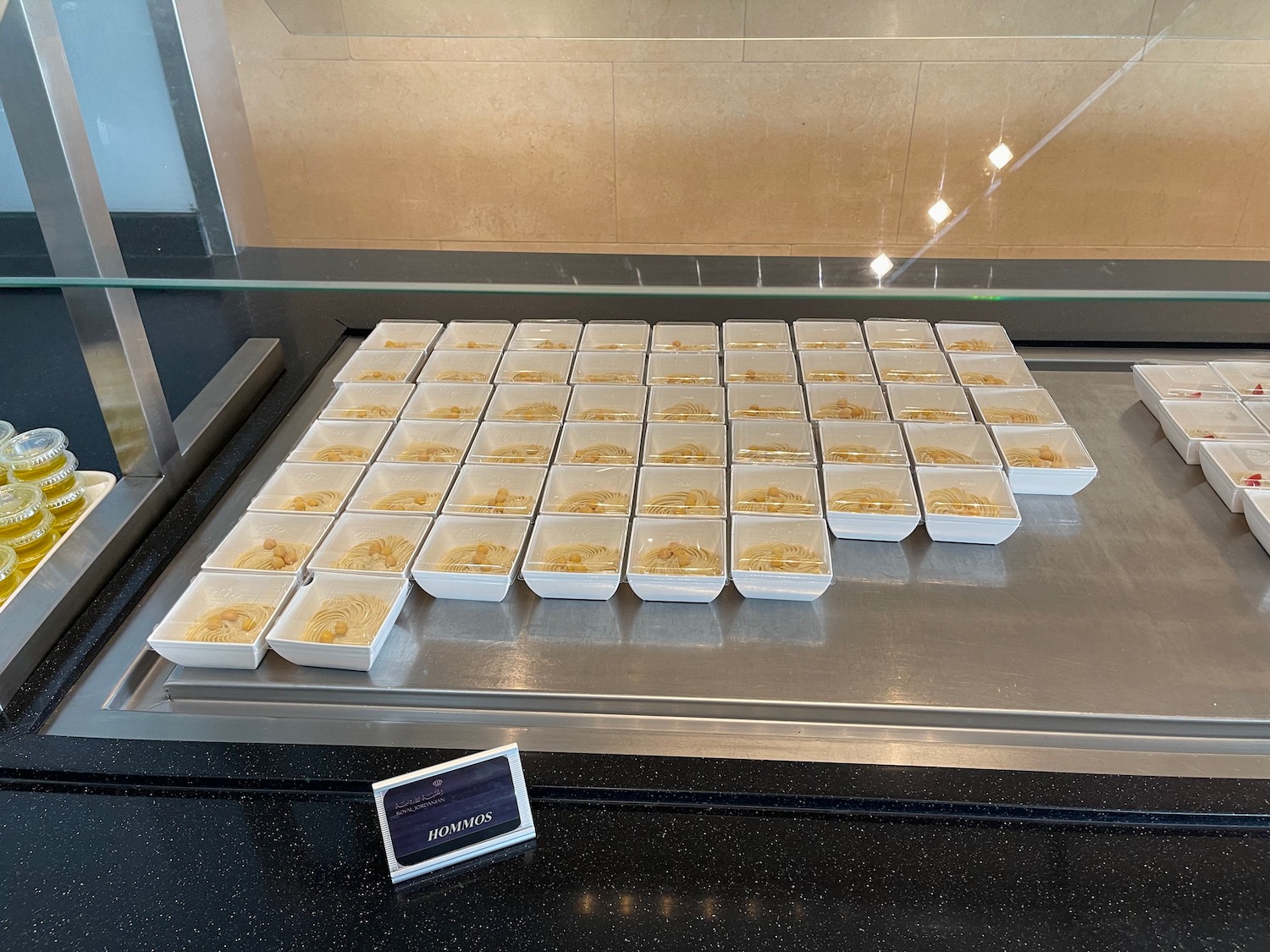 a trays of food on a counter