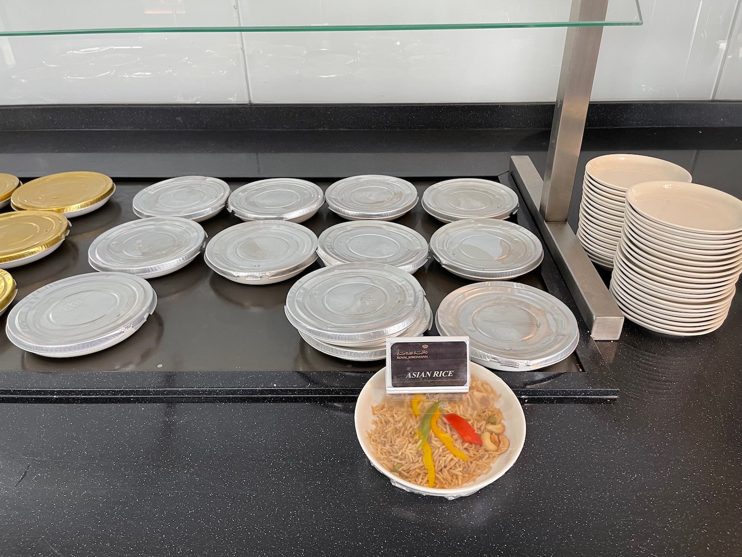 a group of plates and bowls of food