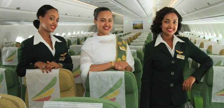 a group of women in flight uniforms