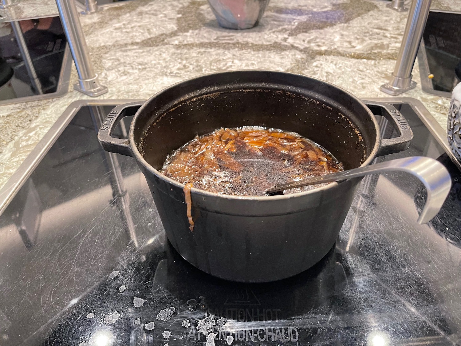 a pot of soup on a stove