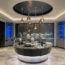 a restaurant with a circular counter and a round counter with a black and white counter