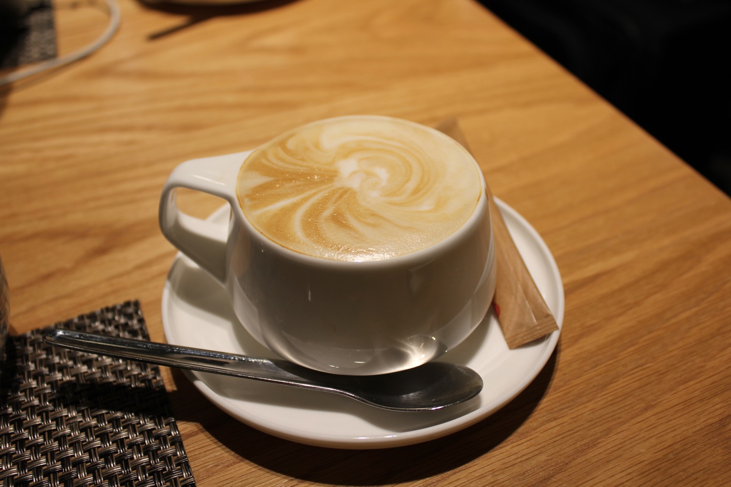 a cup of coffee on a saucer