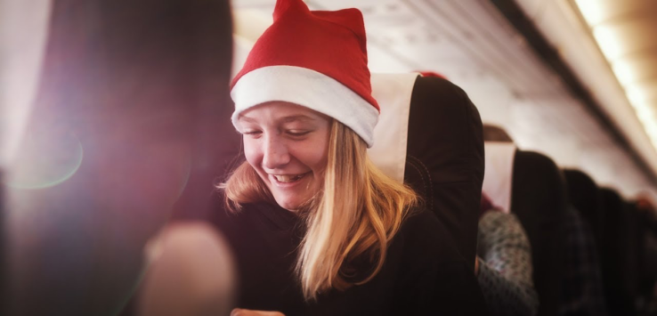 a woman wearing a santa hat