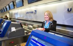 a woman at a check-in counter