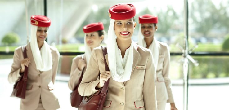 a group of women wearing matching outfits