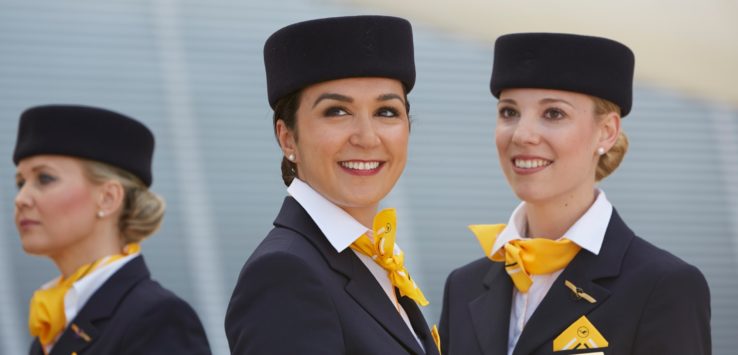 a group of women wearing black uniforms