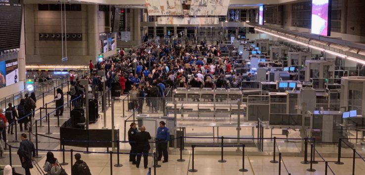 a group of people in a terminal