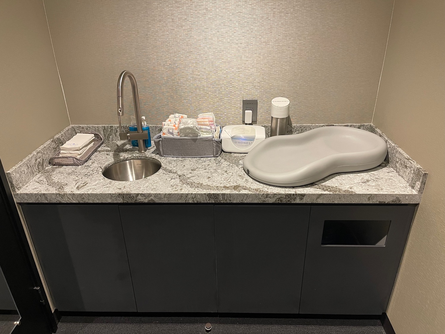 a sink and faucet in a bathroom