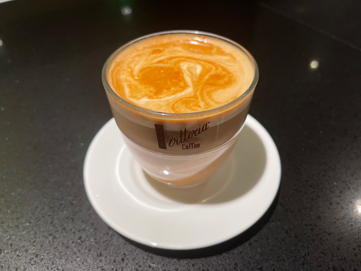 a cup of coffee on a saucer