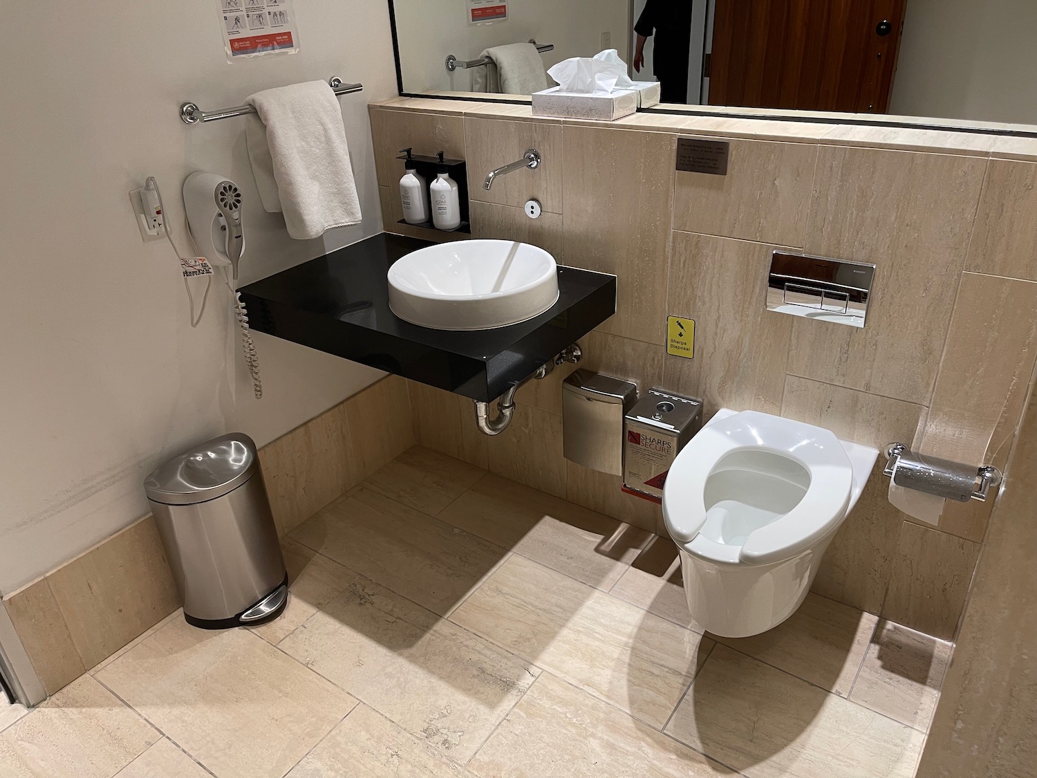 a bathroom with a sink and toilet