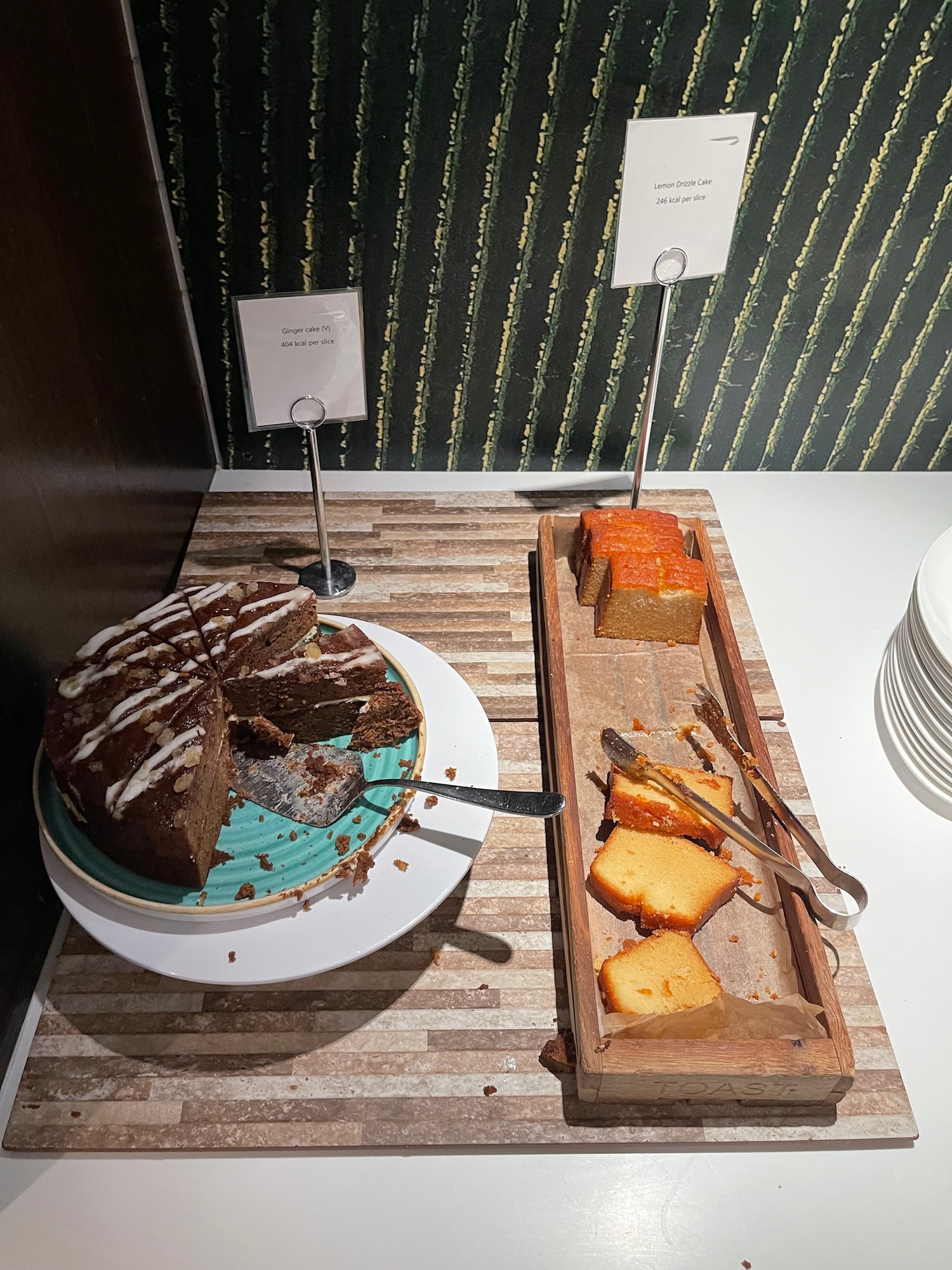 a plate of cake and a tray of cakes