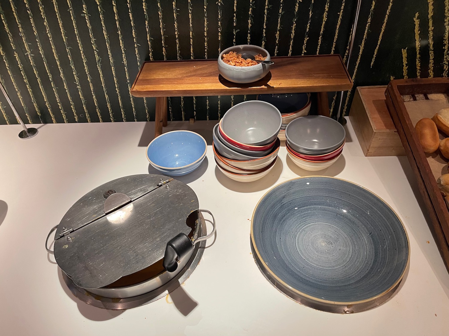 a table with plates and bowls on it