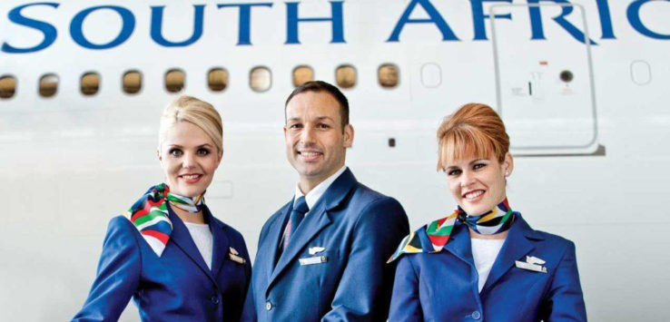 a group of people wearing blue uniforms