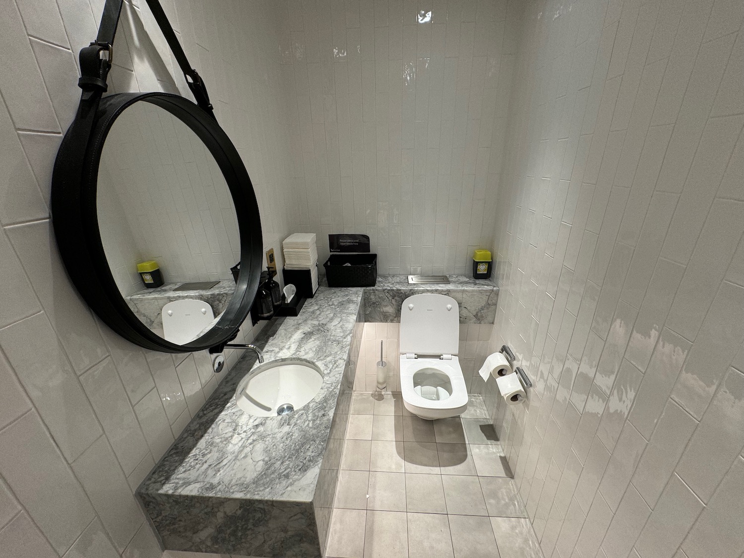 a bathroom with a sink and toilet