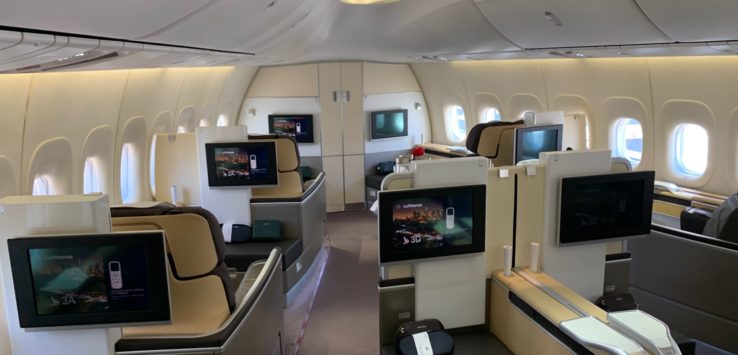 a plane with a television and seats