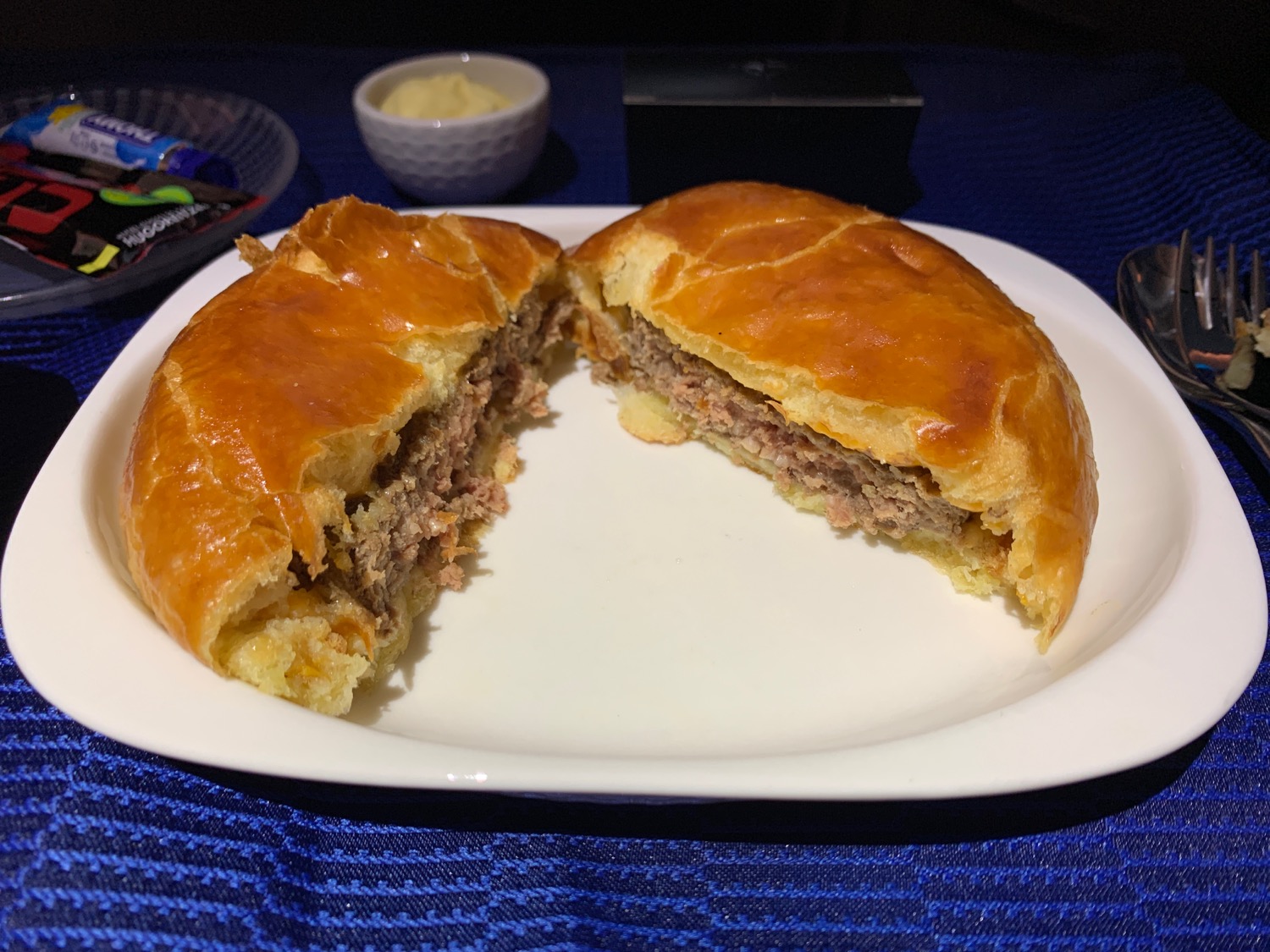 a plate with a pastry cut in half