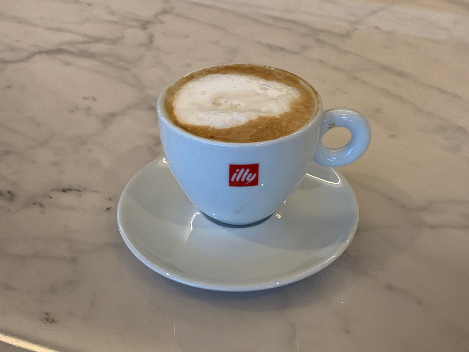 a cup of coffee on a saucer