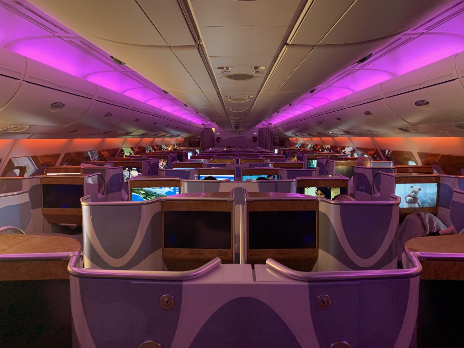 an airplane with purple lights