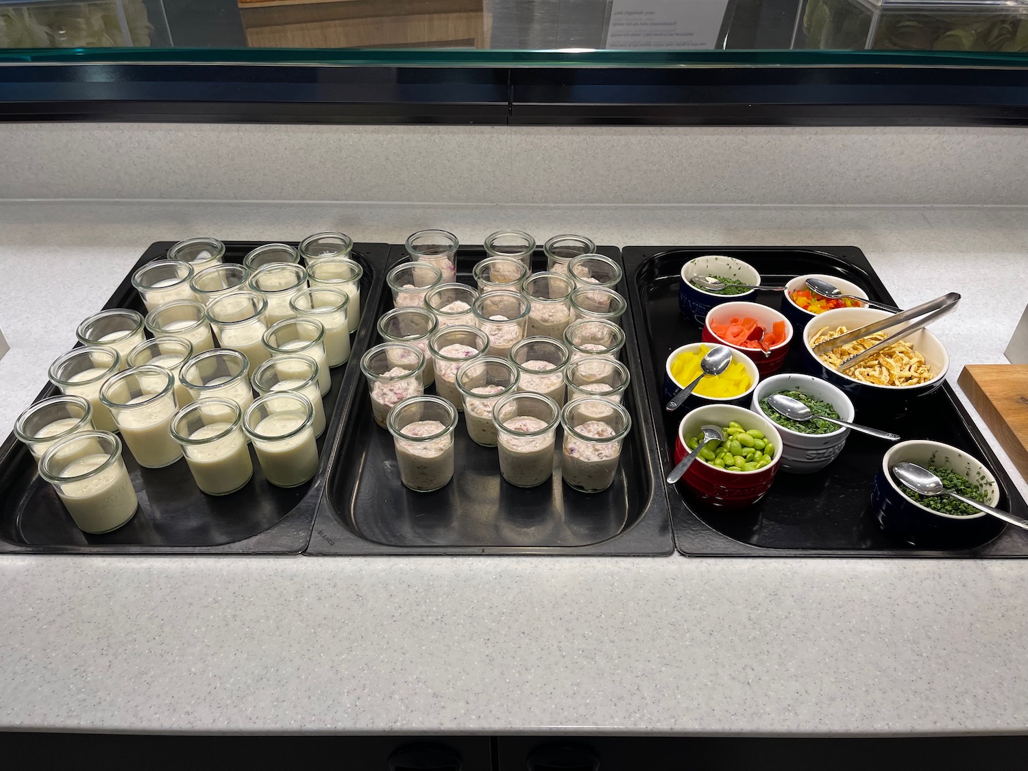 a trays of food on a counter