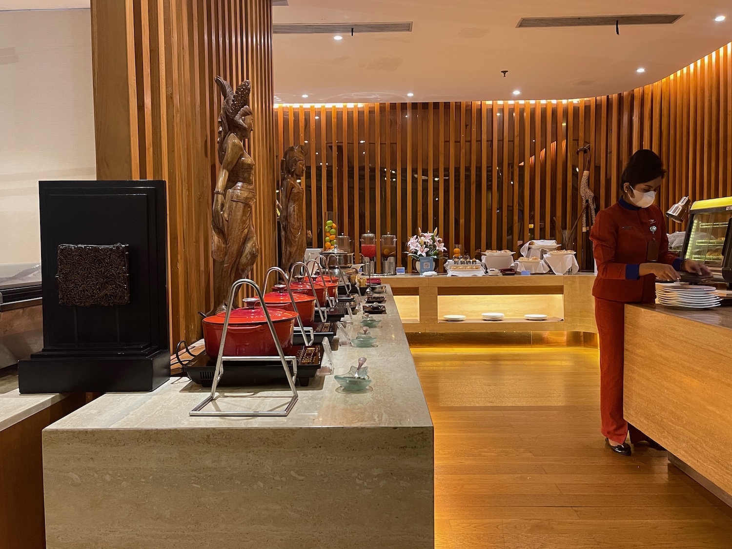 a woman standing in a restaurant