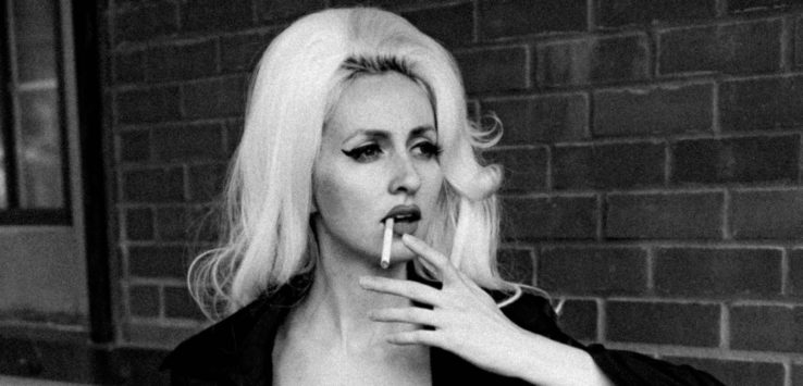 a woman smoking a cigarette