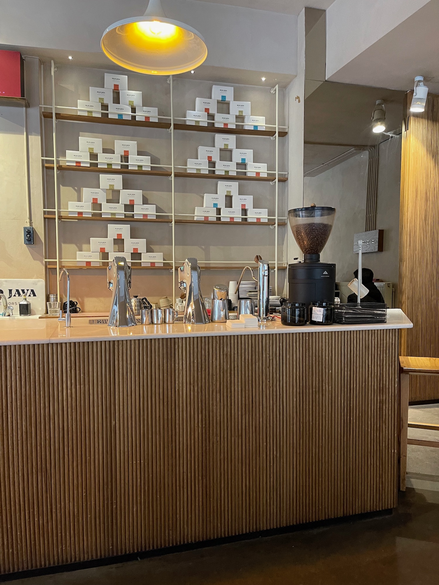 a counter with a coffee machine