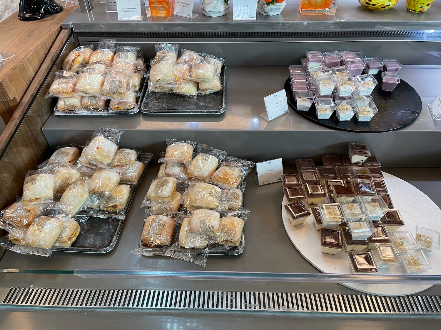 a trays of pastries on a shelf