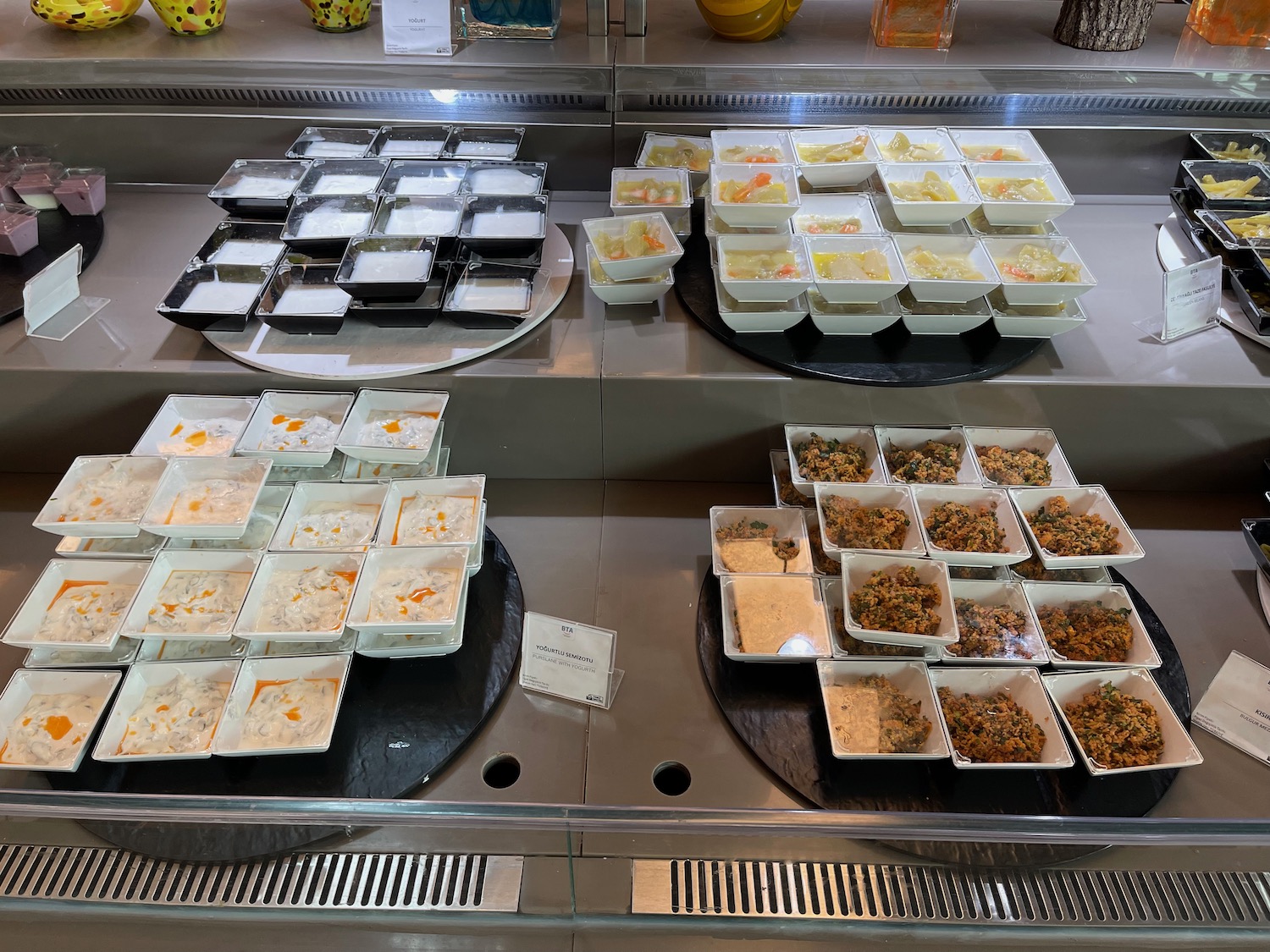 a trays of food on a counter